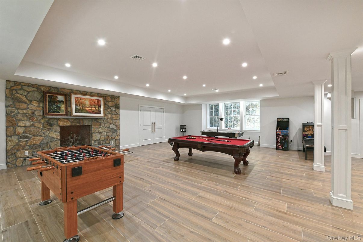 Billiard Table, Game Room, Interior, Recessed Lighting, Stone Walls, Wood Texture Flooring