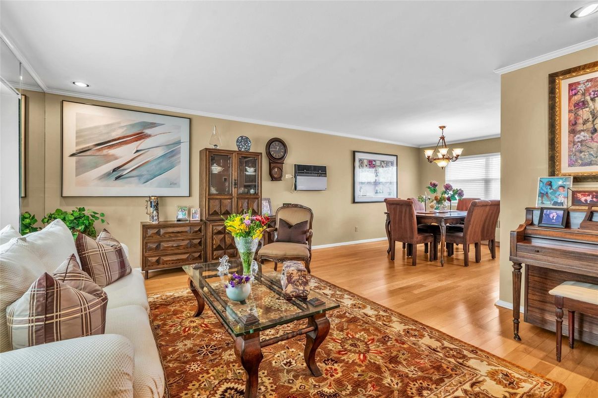 Chandelier, Dining room, Interior, Living room, Piano, Recessed Lighting, Wood Texture Flooring