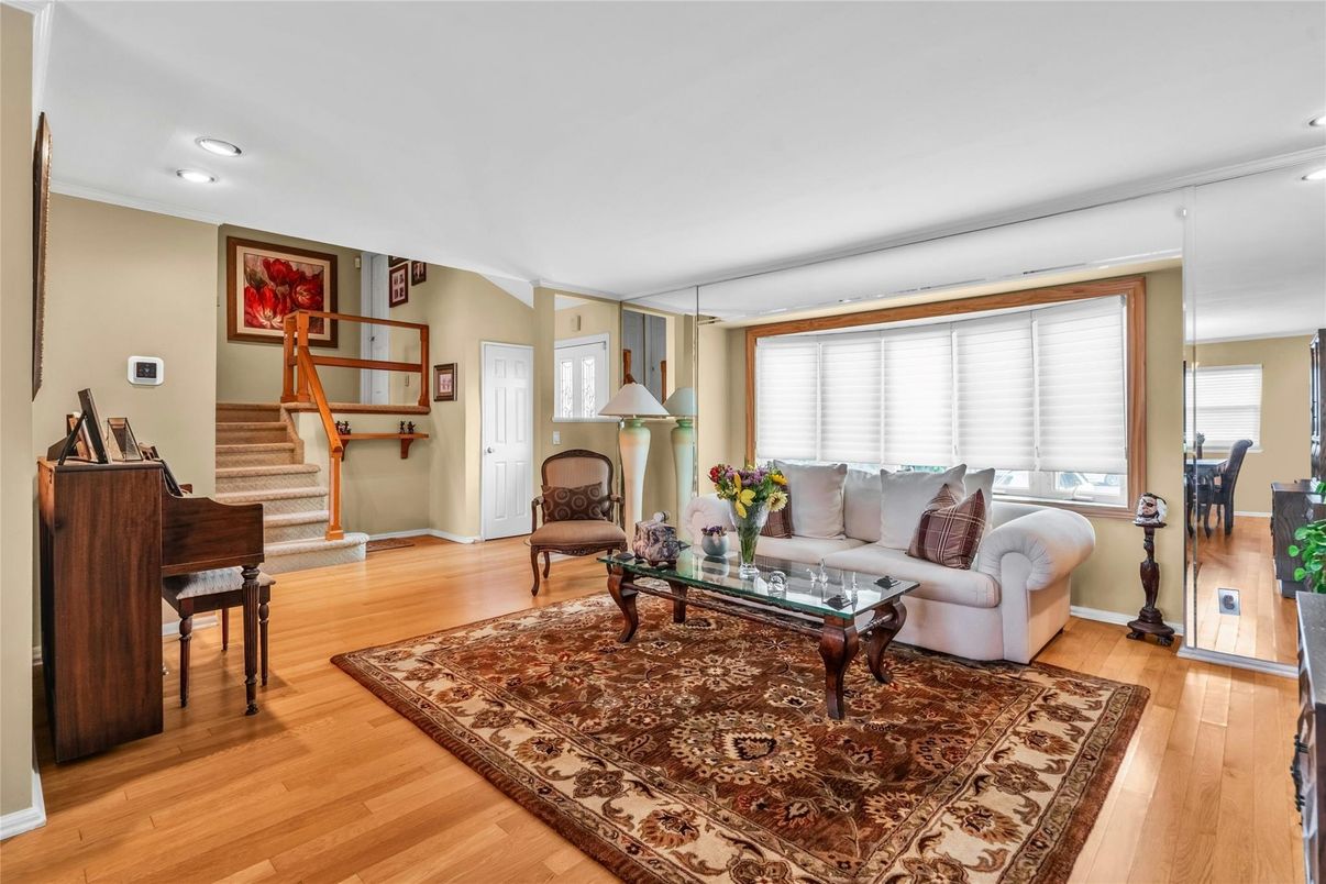 Fireplace, Interior, Living room, Piano, Recessed Lighting, Wood Texture Flooring