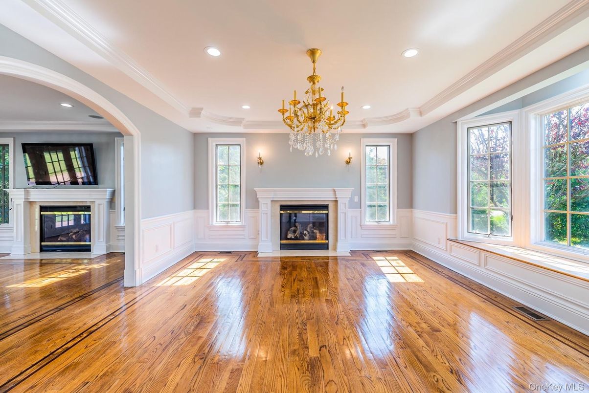 Chandelier, Empty room, Fireplace, Interior, Recessed Lighting, Wood Texture Flooring