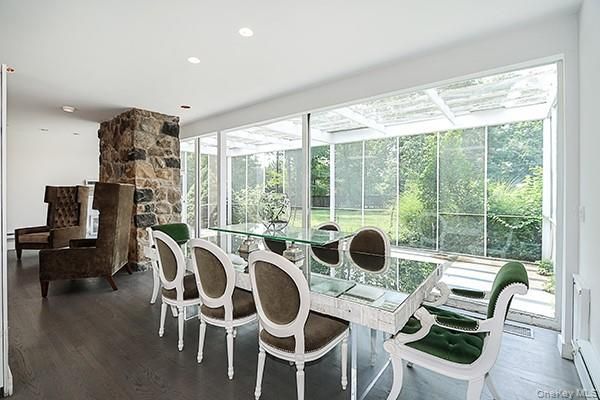Dining room, Interior, Recessed Lighting, Stone Walls, Sun Room, Wood Texture Flooring