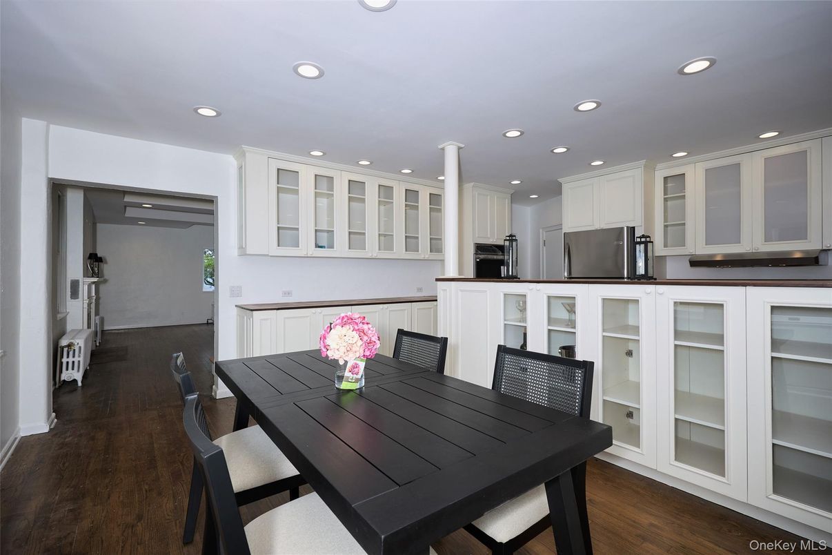 Dining room, Interior, Kitchen, Recessed Lighting, Stainless Steel Appliances, Wood Texture Flooring