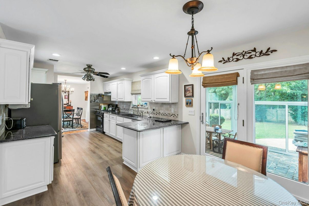 Chandelier, Dining room, Interior, Kitchen, Pendant Lights, Recessed Lighting, Wood Texture Flooring