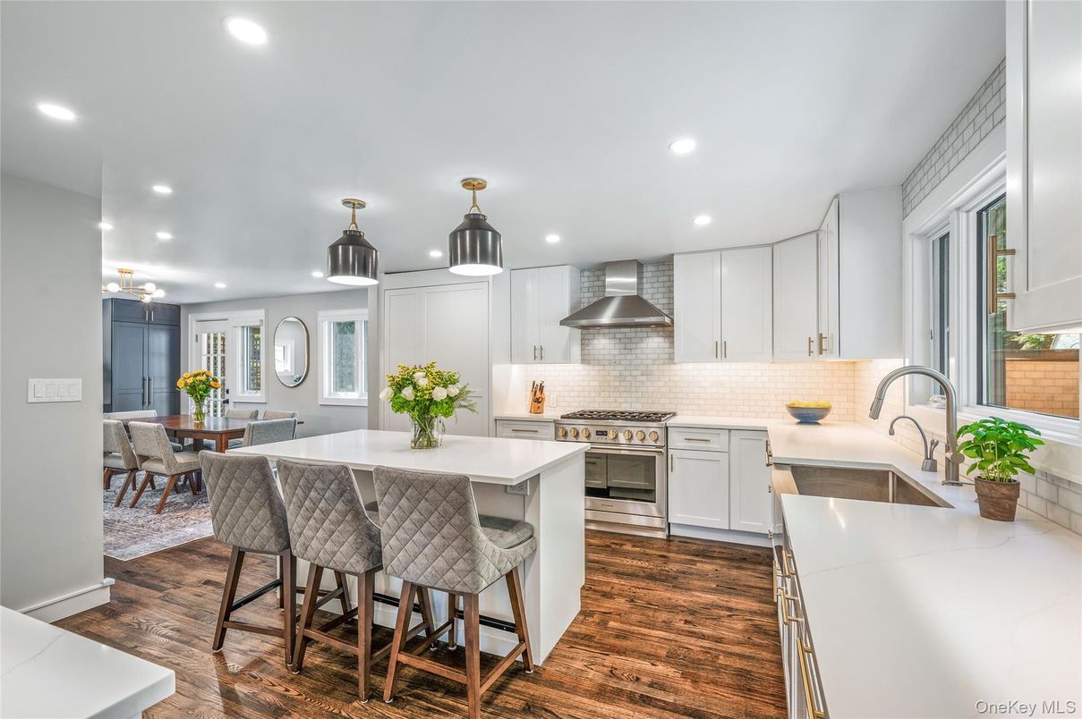 Dining room, Interior, Kitchen, Pendant Lights, Recessed Lighting, Stainless Steel Appliances, Wood Texture Flooring
