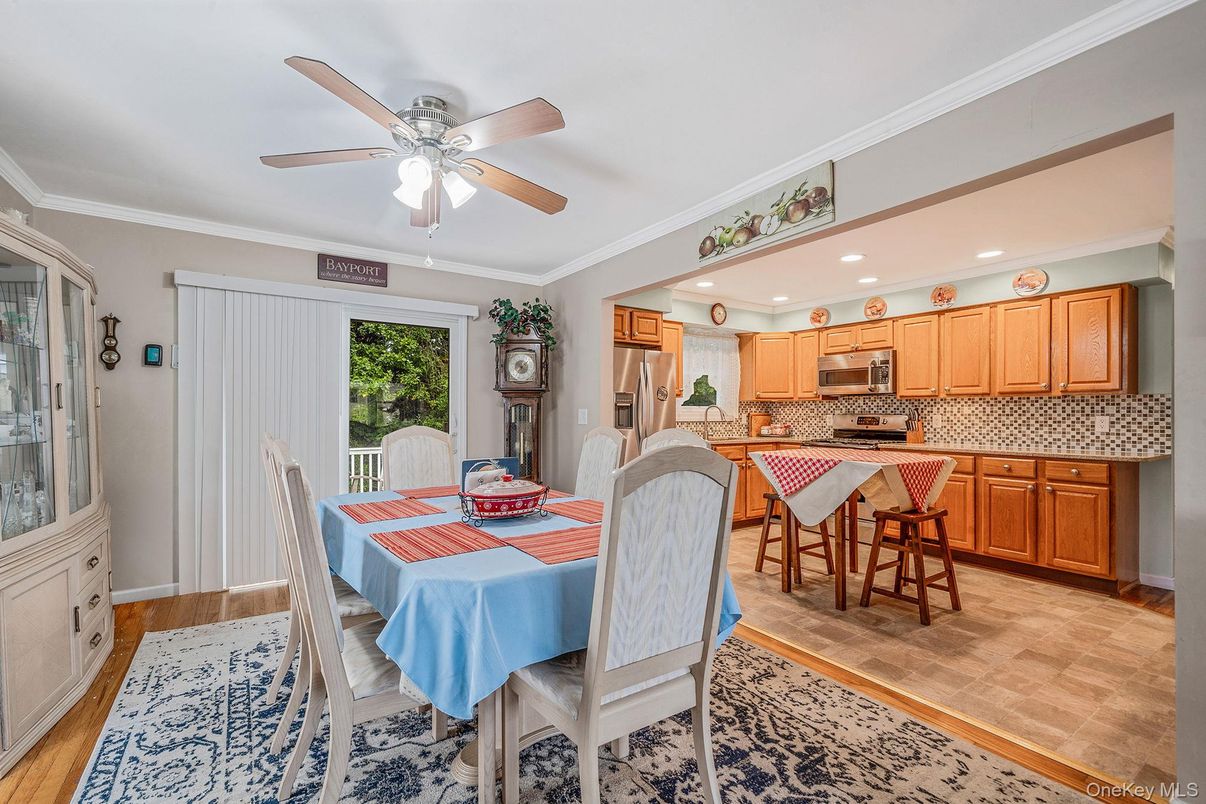 Dining room, Interior, Kitchen, Recessed Lighting, Stainless Steel Appliances, Wood Texture Flooring
