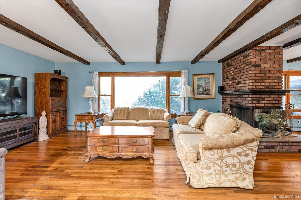 Fireplace, Interior, Living room, Stone Walls, Wooden Beams, Wood Texture Flooring