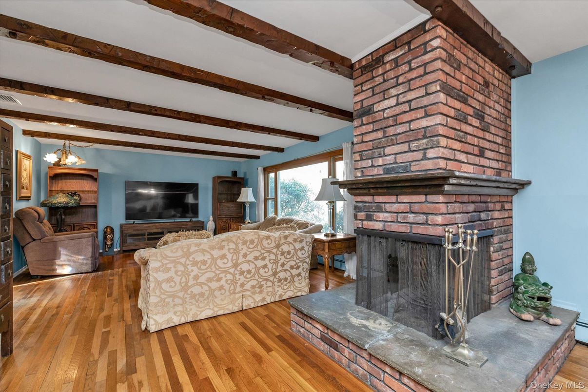 Fireplace, Interior, Living room, Stone Walls, Wooden Beams, Wood Texture Flooring