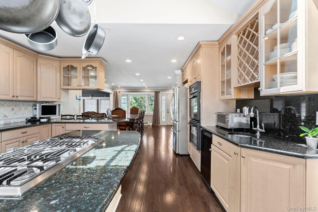 Dining room, Interior, Kitchen, Recessed Lighting, Stainless Steel Appliances, Wood Texture Flooring