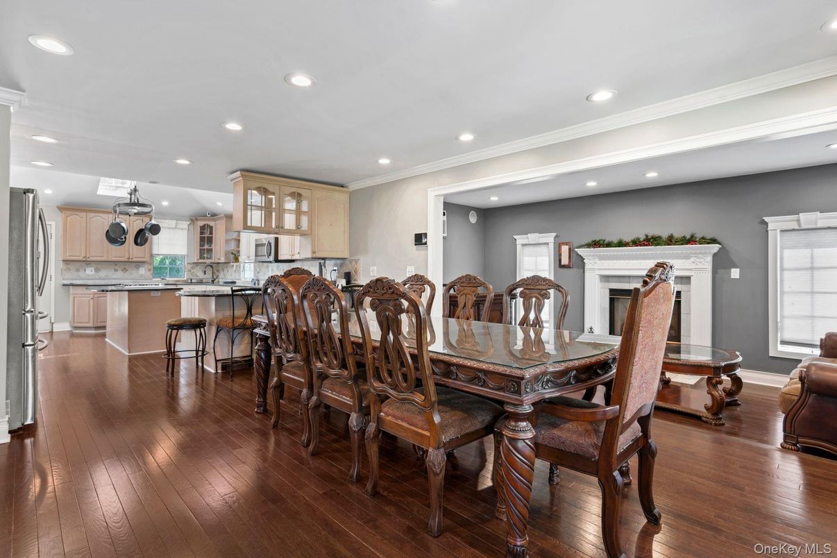 Dining room, Fireplace, Interior, Kitchen, Recessed Lighting, Wood Texture Flooring
