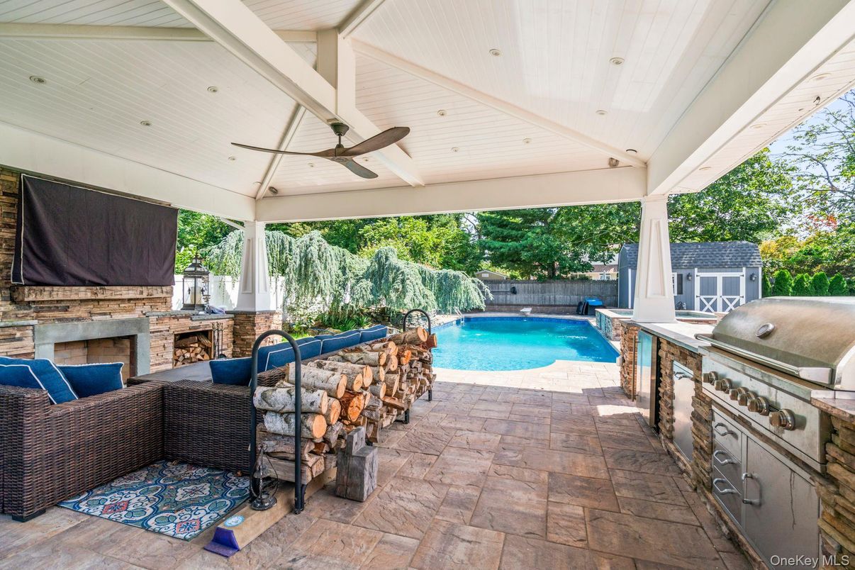 Exterior, Fireplace, Outdoor Kitchen, Pool