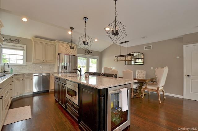 Dining room, Interior, Kitchen, Pendant Lights, Recessed Lighting, Stainless Steel Appliances, Wood Texture Flooring