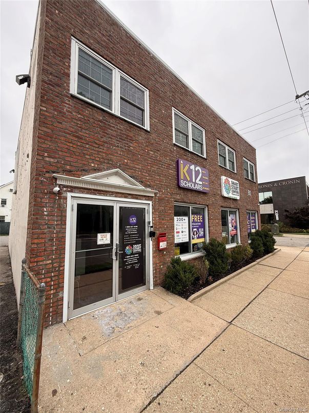 Exterior, Facade, Brick Facade, Condo Building