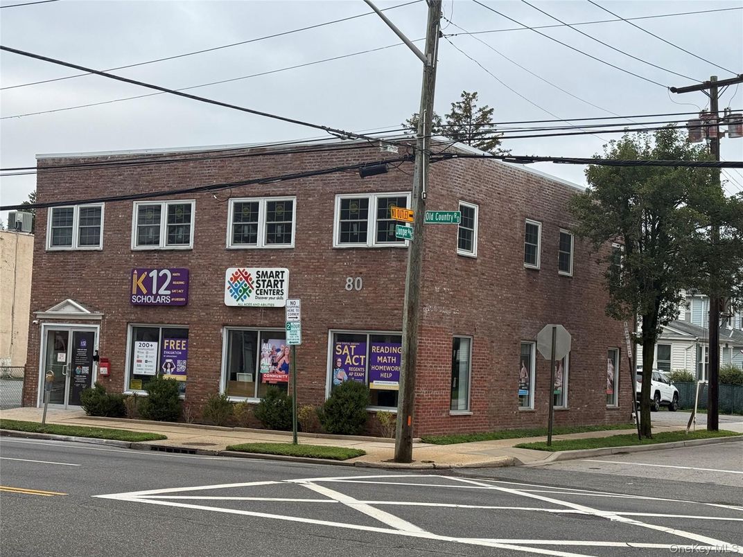 Exterior, Facade, Brick Facade, Condo Building