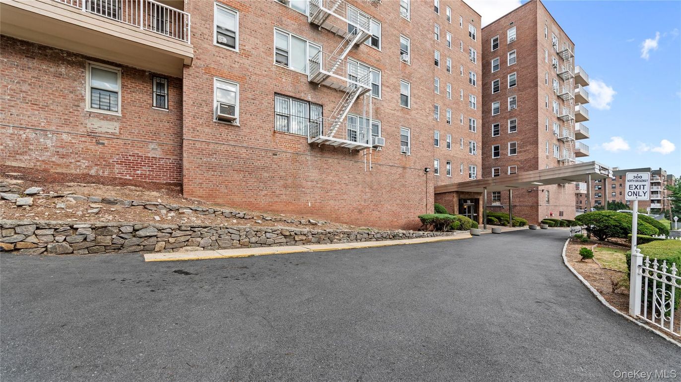 Exterior, Facade, Brick Facade, Condo Building