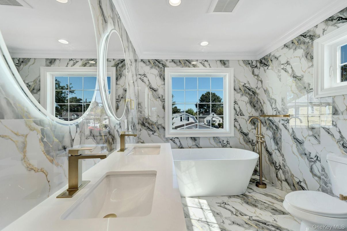 Bathroom, Dual Sink Vanities, Free Standing Baths, Interior, Marble, Marble Walls, Recessed Lighting