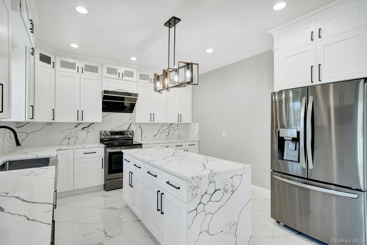 Interior, Kitchen, Marble, Marble Walls, Pendant Lights, Recessed Lighting, Stainless Steel Appliances