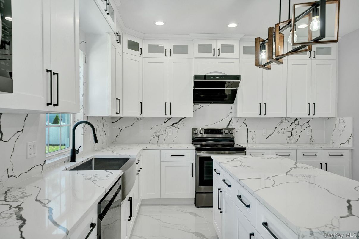 Interior, Kitchen, Marble, Marble Walls, Recessed Lighting, Stainless Steel Appliances