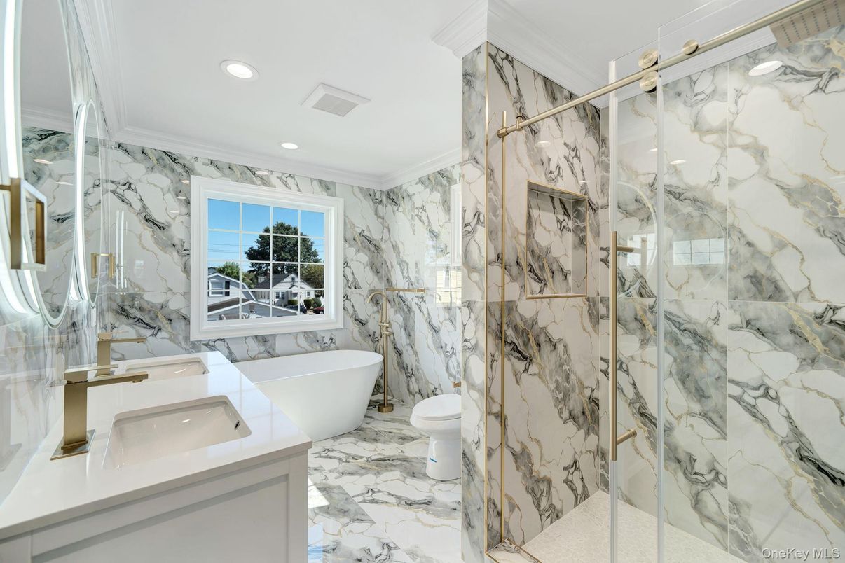 Bathroom, Free Standing Baths, Glass Shower, Interior, Marble, Marble Walls, Recessed Lighting