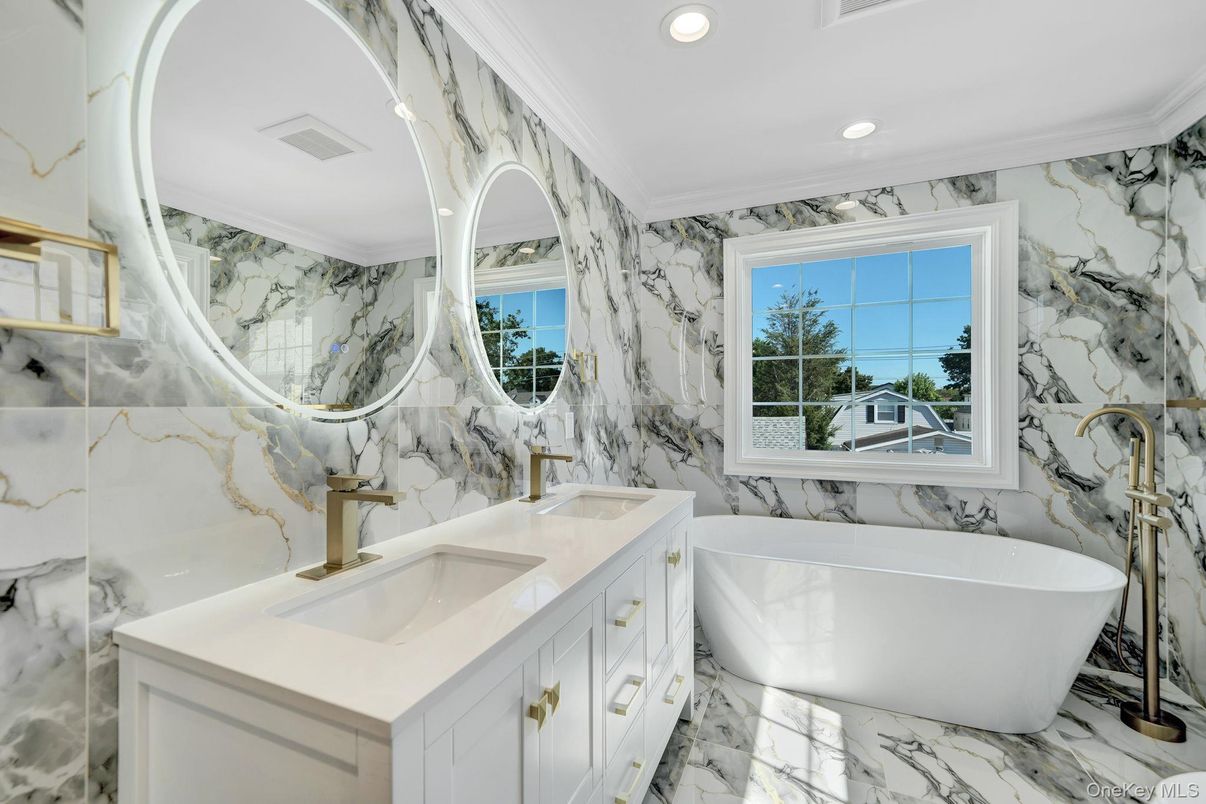 Bathroom, Dual Sink Vanities, Free Standing Baths, Interior, Marble, Marble Walls, Recessed Lighting