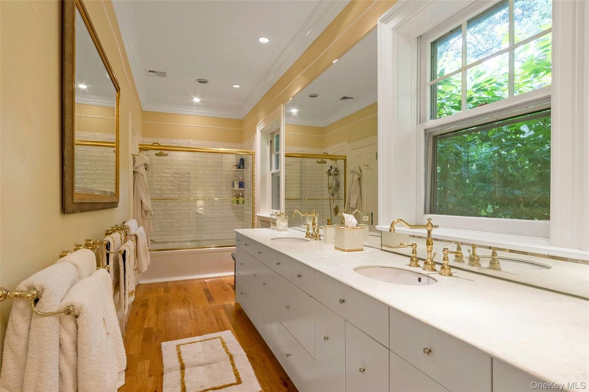 Bathroom, Dual Sink Vanities, Glass Shower, Interior, Recessed Lighting, Wood Texture Flooring
