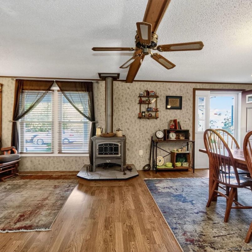 Dining room, Fireplace, Interior, Stone Walls, Wood Texture Flooring