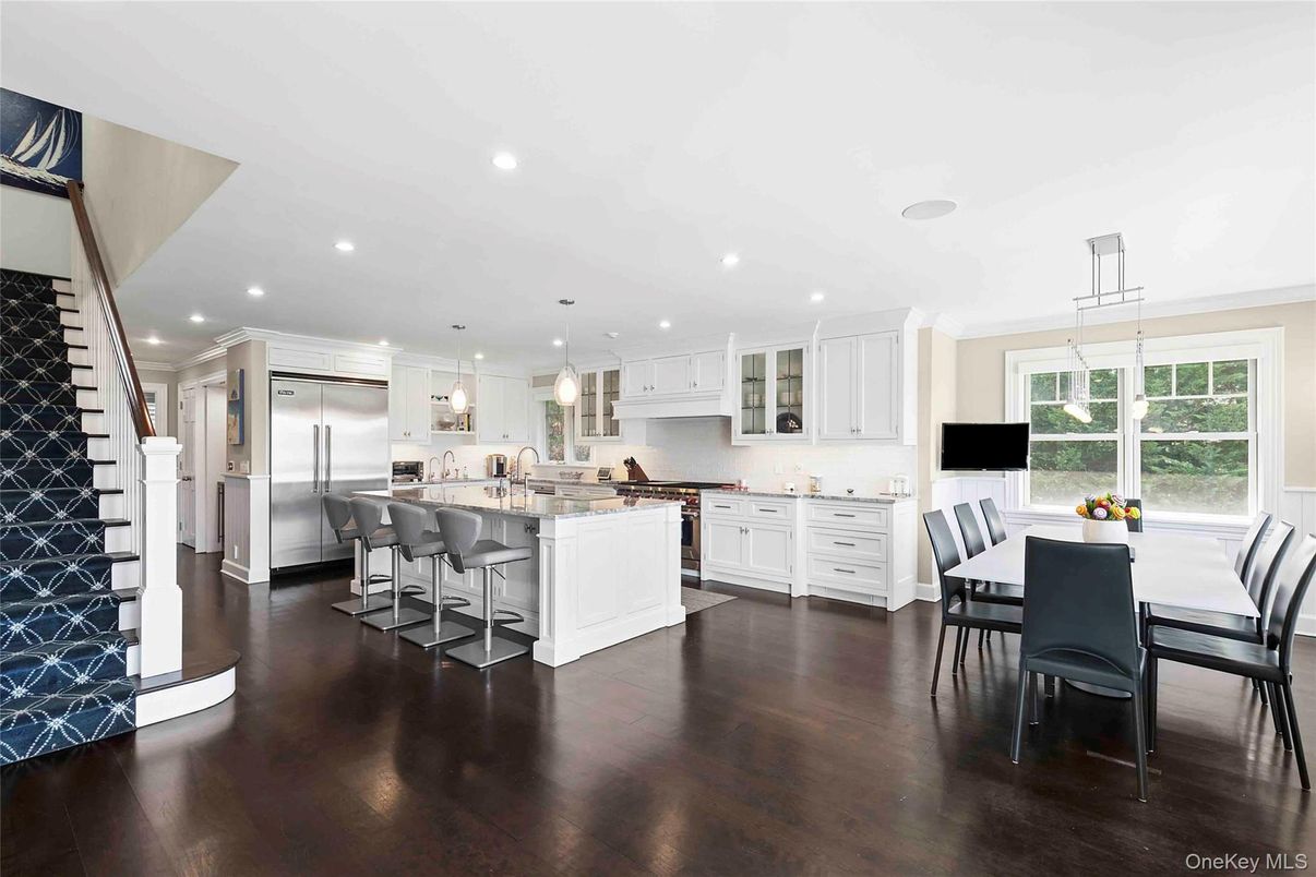 Dining room, Interior, Kitchen, Pendant Lights, Recessed Lighting, Stainless Steel Appliances, Wood Texture Flooring