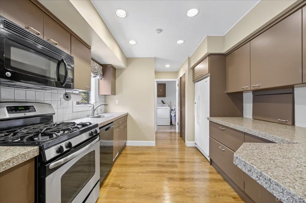Interior, Kitchen, Recessed Lighting, Stainless Steel Appliances, Washer, Wood Texture Flooring