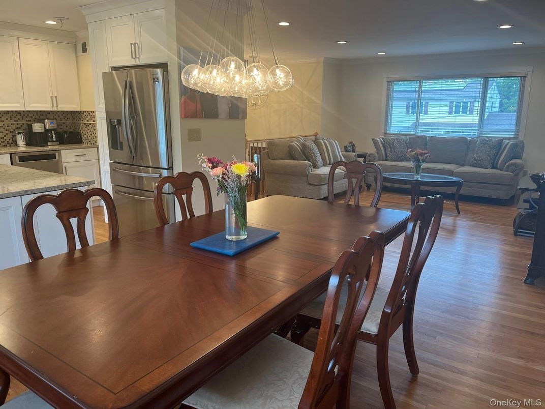 Dining room, Interior, Kitchen, Living room, Pendant Lights, Recessed Lighting, Stainless Steel Appliances, Wood Texture Flooring