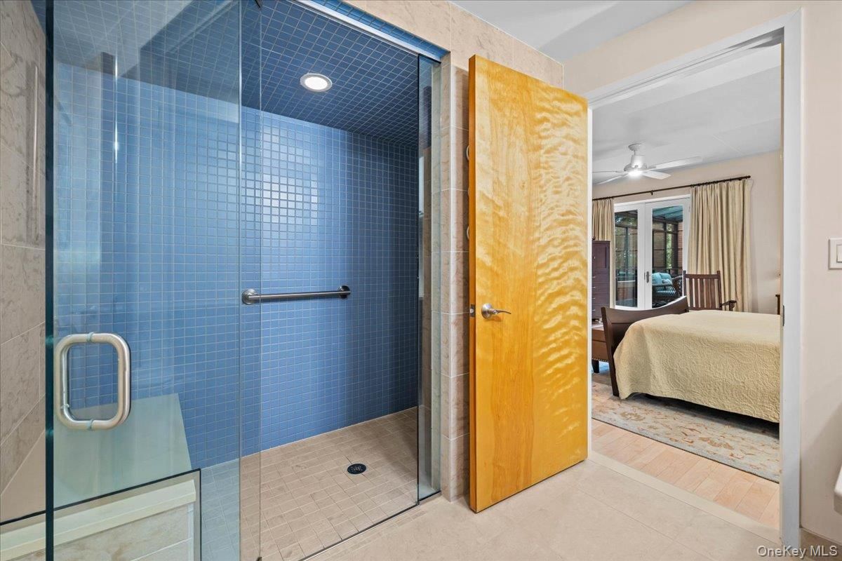 Bathroom, Bedroom, Glass Shower, Interior, Recessed Lighting, Wood Texture Flooring