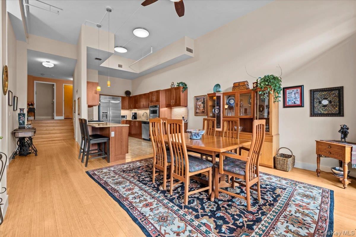 Dining room, Interior, Kitchen, Pendant Lights, Stainless Steel Appliances, Wood Texture Flooring
