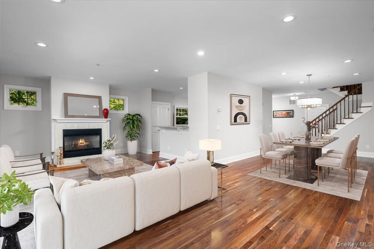 Dining room, Fireplace, Interior, Living room, Pendant Lights, Recessed Lighting, Wood Texture Flooring