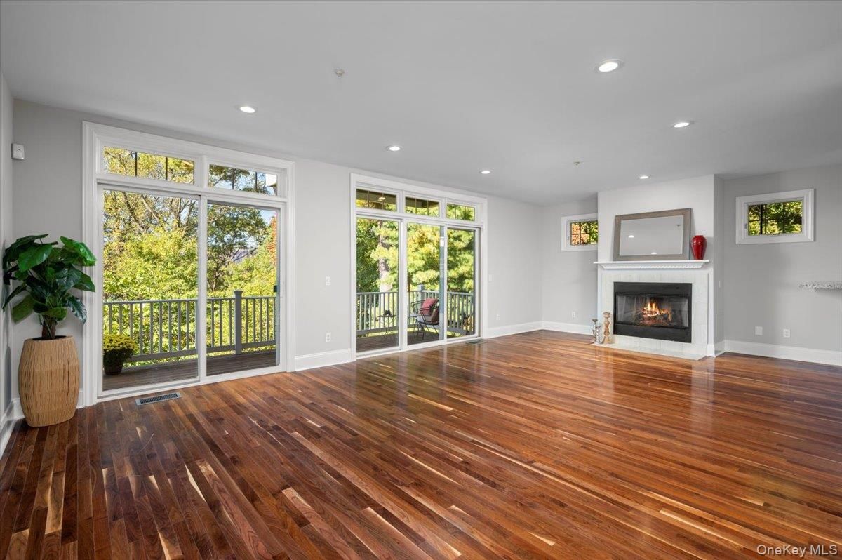 Empty room, Fireplace, Interior, Recessed Lighting, Wood Texture Flooring