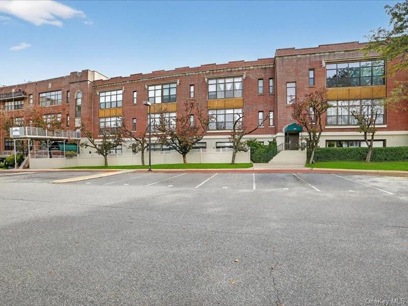 Exterior, Facade, Brick Facade, Condo Building