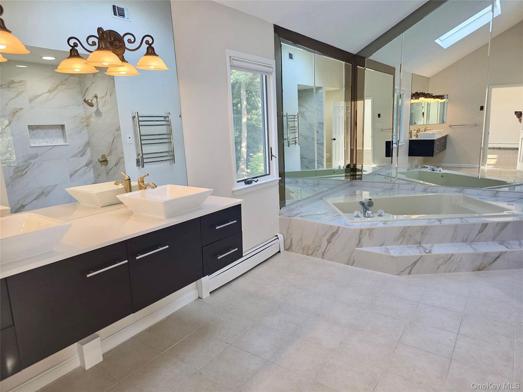 Bathroom, Dual Sink Vanities, Glass Shower, Interior, Marble Walls, Recessed Lighting