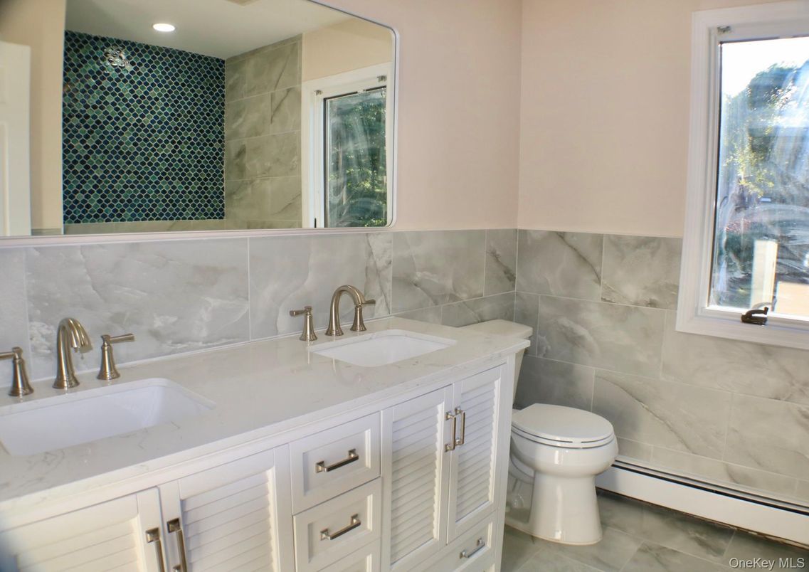 Bathroom, Dual Sink Vanities, Interior, Marble Walls, Recessed Lighting