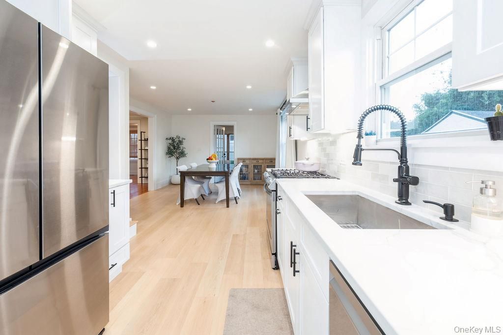 Dining room, Interior, Kitchen, Recessed Lighting, Stainless Steel Appliances, Wood Texture Flooring