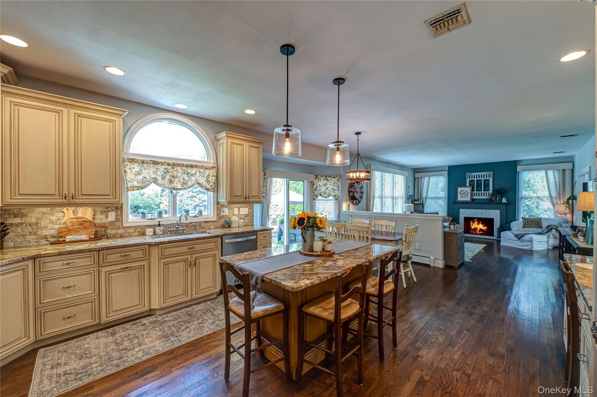 Dining room, Fireplace, Interior, Kitchen, Living room, Pendant Lights, Recessed Lighting, Wood Texture Flooring