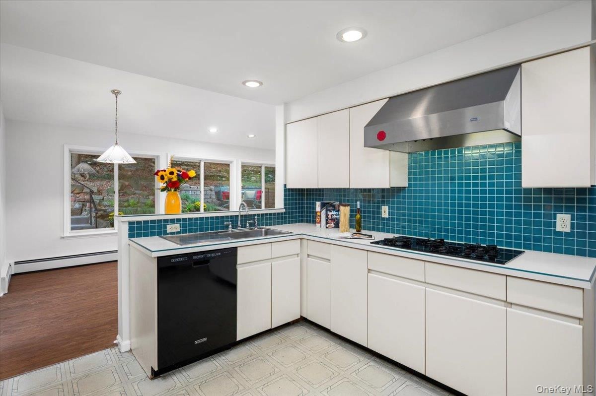 Interior, Kitchen, Pendant Lights, Recessed Lighting, Tile Countertops, Wood Texture Flooring