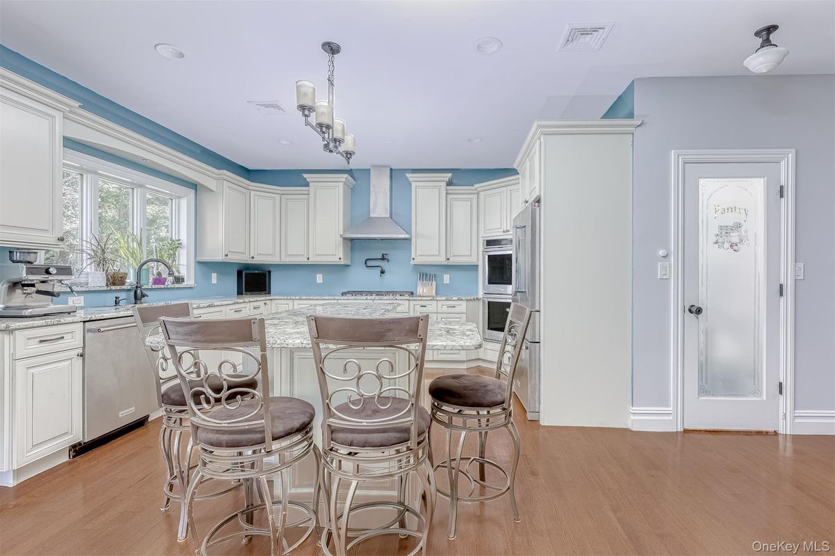 Chandelier, Interior, Kitchen, Recessed Lighting, Stainless Steel Appliances, Wood Texture Flooring