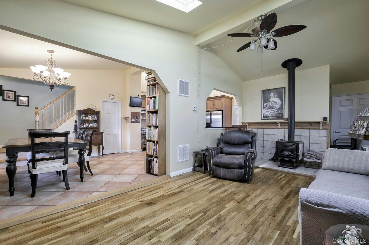 Chandelier, Dining room, Fireplace, Interior, Wood Texture Flooring