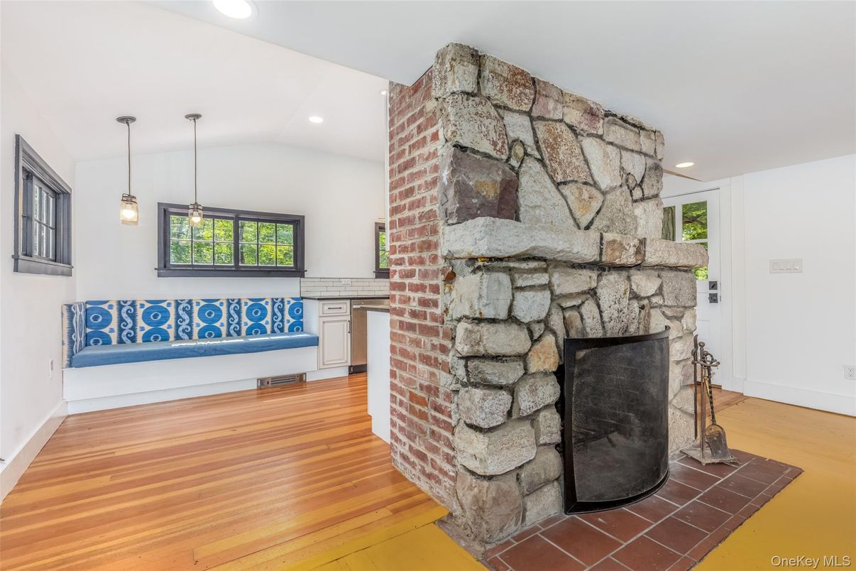Fireplace, Interior, Pendant Lights, Recessed Lighting, Stone Walls, Wood Texture Flooring