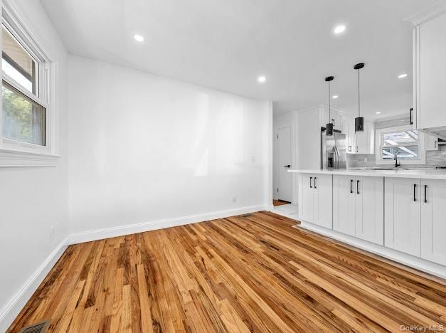 Empty room, Interior, Kitchen, Pendant Lights, Recessed Lighting, Wood Texture Flooring