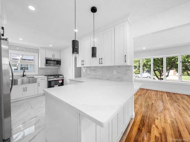Interior, Kitchen, Marble, Pendant Lights, Recessed Lighting, Stainless Steel Appliances, Wood Texture Flooring