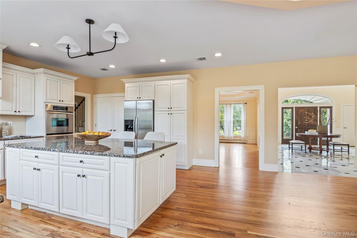 Dining room, Interior, Kitchen, Recessed Lighting, Stainless Steel Appliances, Wood Texture Flooring