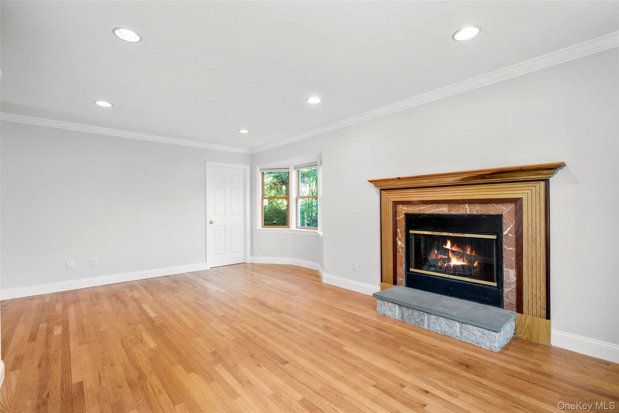 Empty room, Fireplace, Interior, Recessed Lighting, Wood Texture Flooring