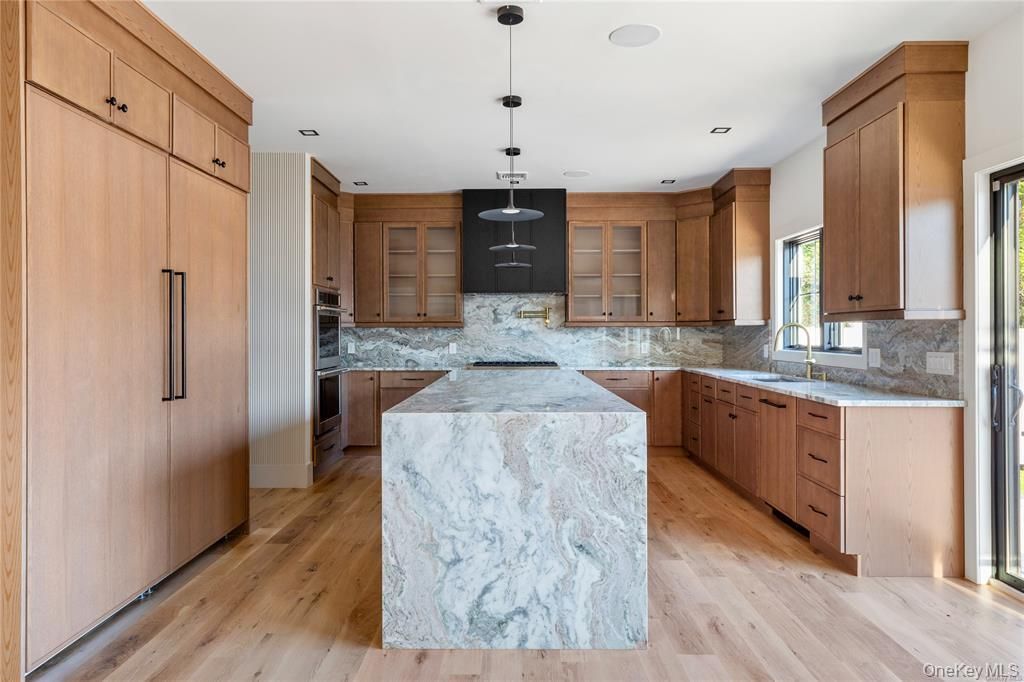 Interior, Kitchen, Marble Walls, Pendant Lights, Recessed Lighting, Wood Texture Flooring