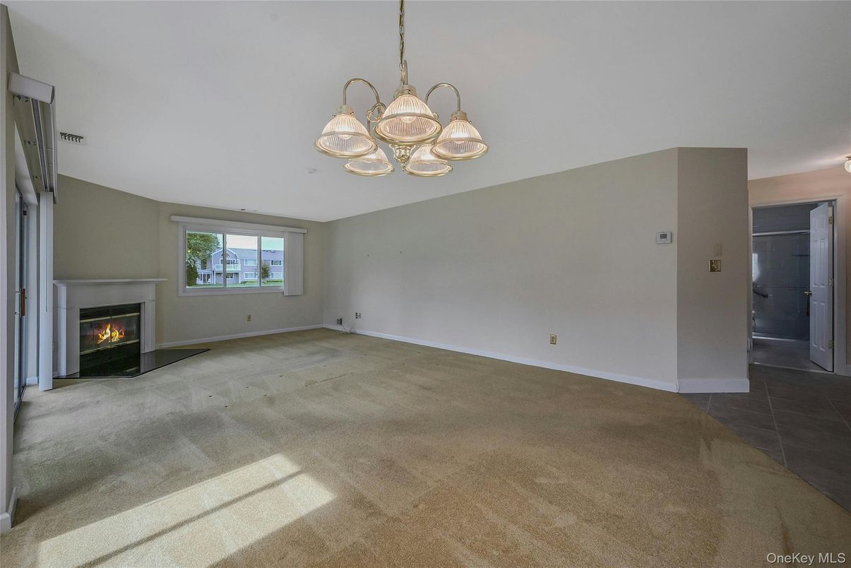 Chandelier, Empty room, Fireplace, Interior