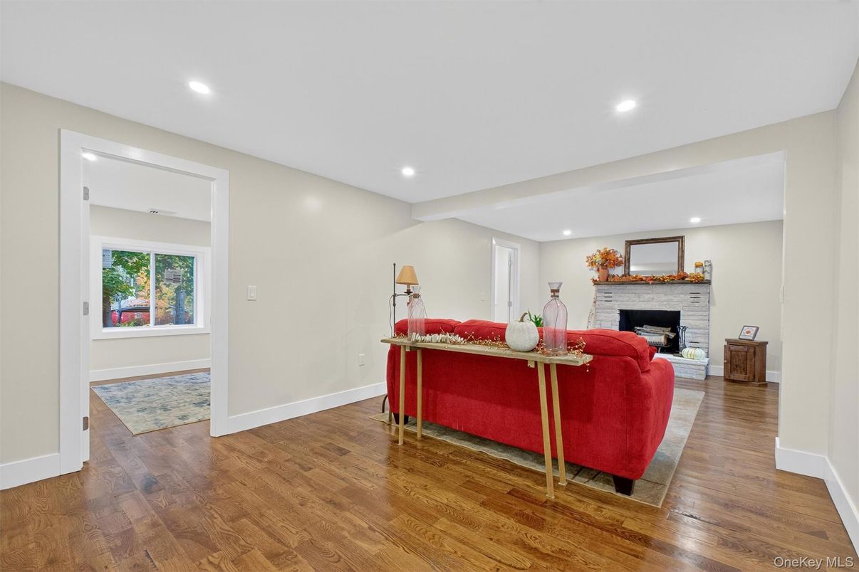 Fireplace, Interior, Living room, Recessed Lighting, Wood Texture Flooring