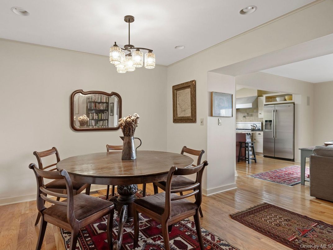 Chandelier, Dining room, Interior, Kitchen, Pendant Lights, Recessed Lighting, Stainless Steel Appliances, Wood Texture Flooring