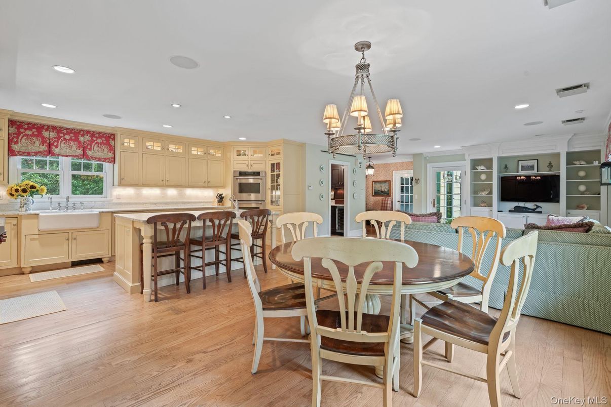 Chandelier, Dining room, Interior, Kitchen, Recessed Lighting, Stainless Steel Appliances, Wood Texture Flooring